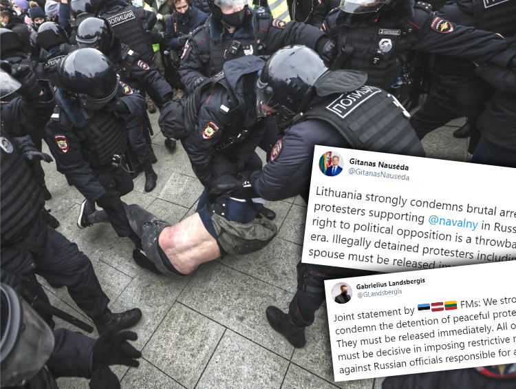 Bity przez rosyjską policję człowiek leży na ziemi
